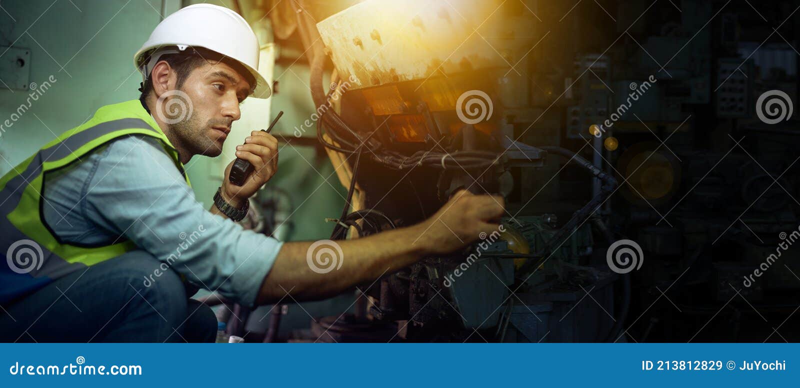 The Industrial Mechanic Technician is Repairing the Machine Stock Image