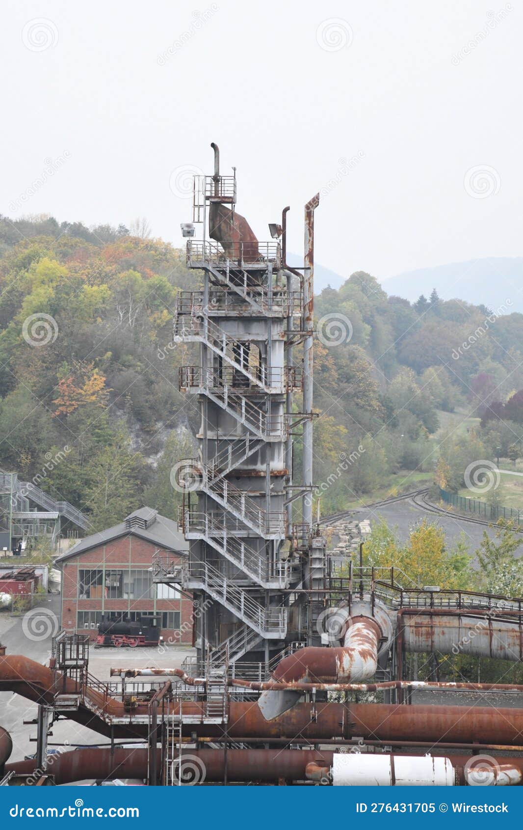 Industrial Pipe Yard Featuring an Array of Pipes Descending Down a