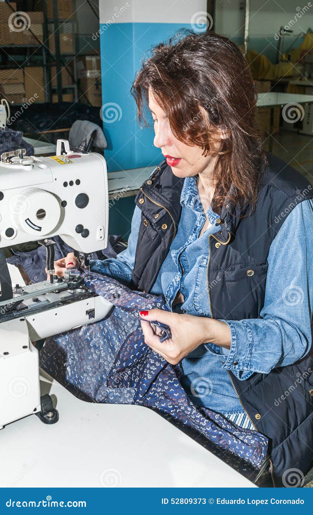 Industrial Sewing Machines with Sewing Machine Operator Stock Image