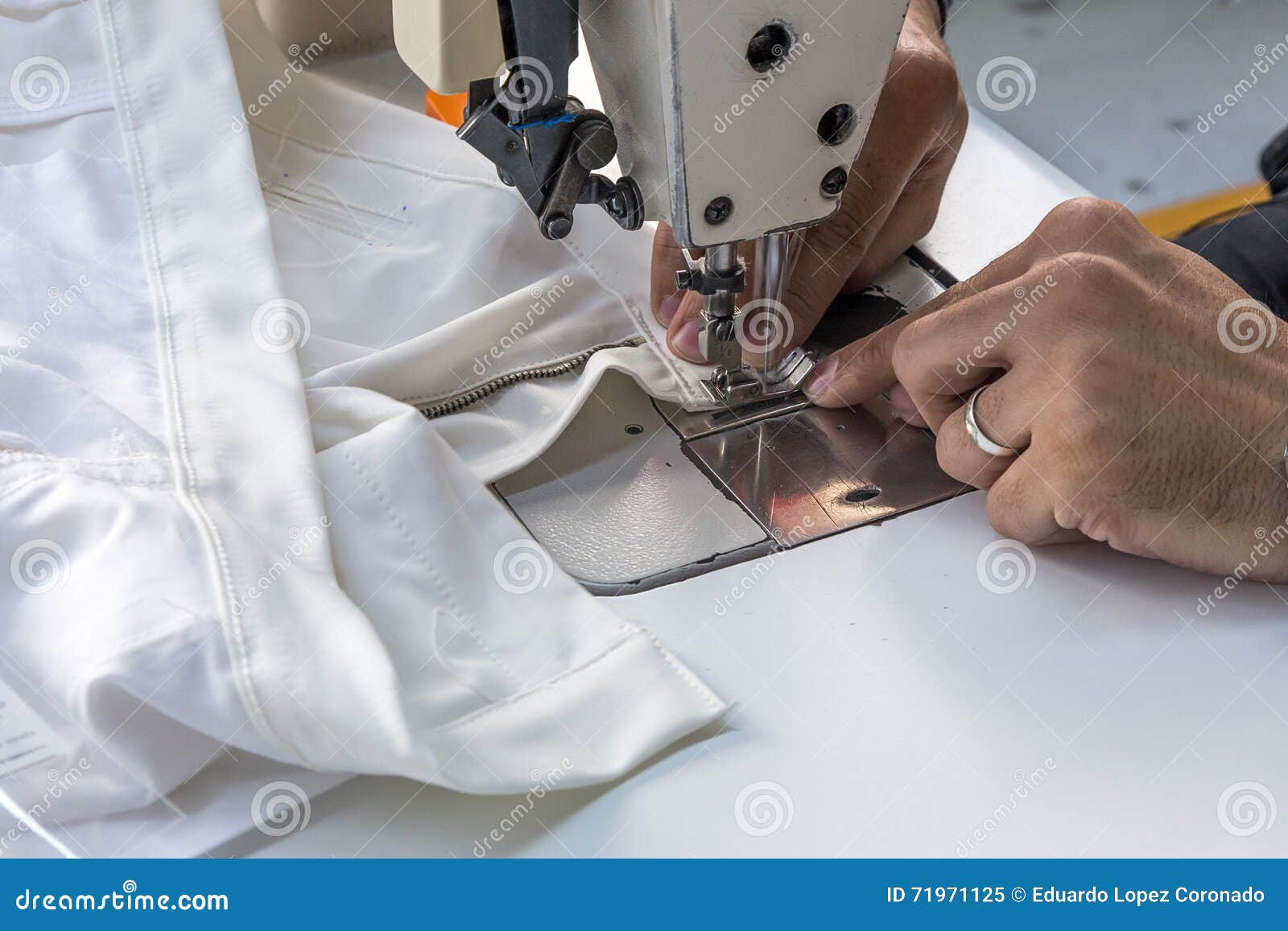 Industrial Sewing Machines with Sewing Machine Operator Stock Image
