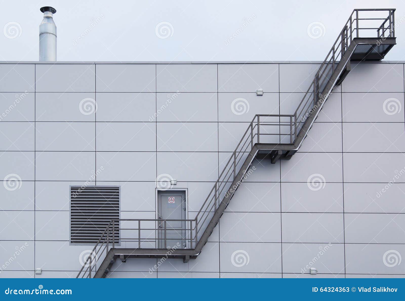 industrial stairway on steel modern tile facade