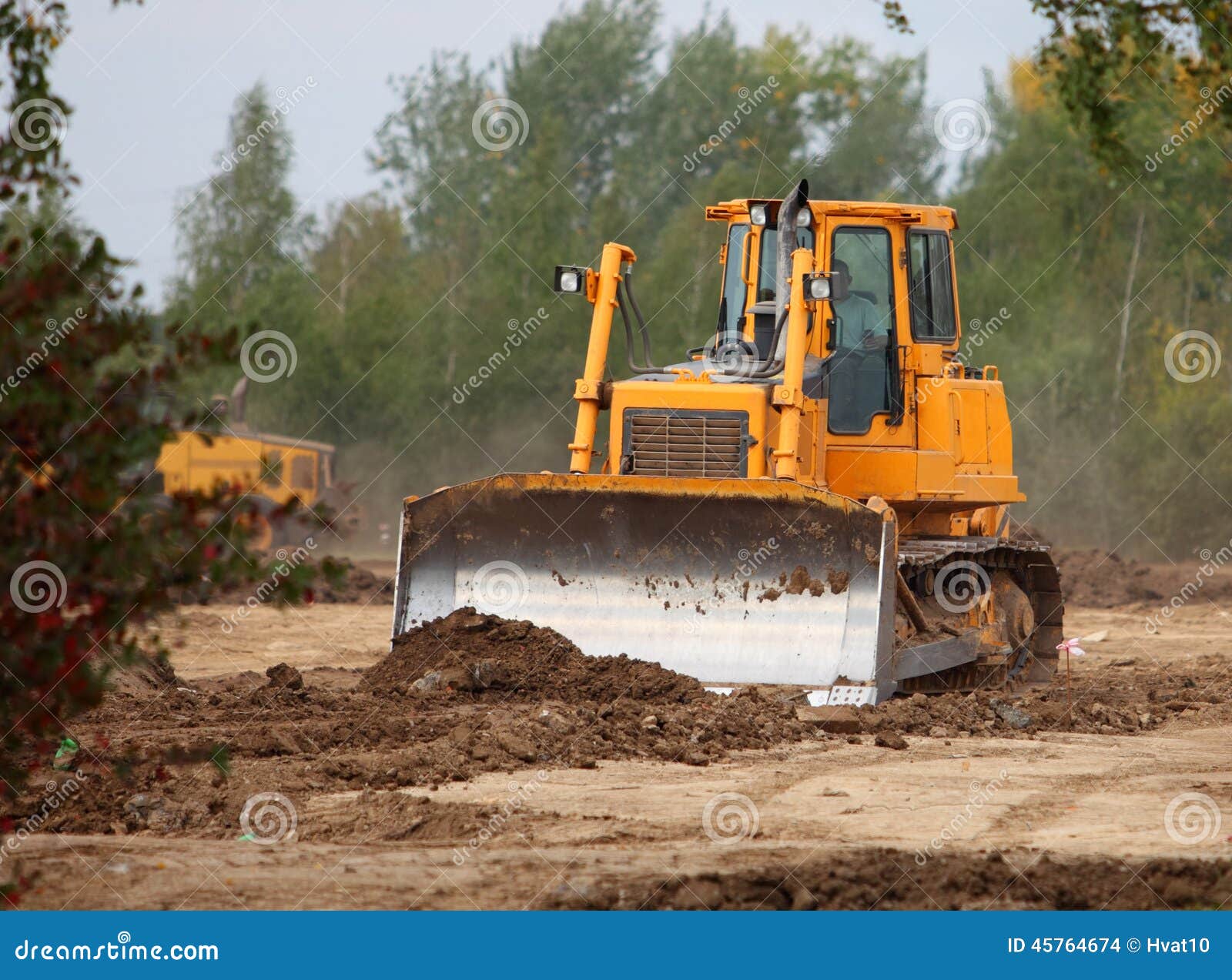 Industrial Technologies Bulldozer on a Construction Site Stock Photo