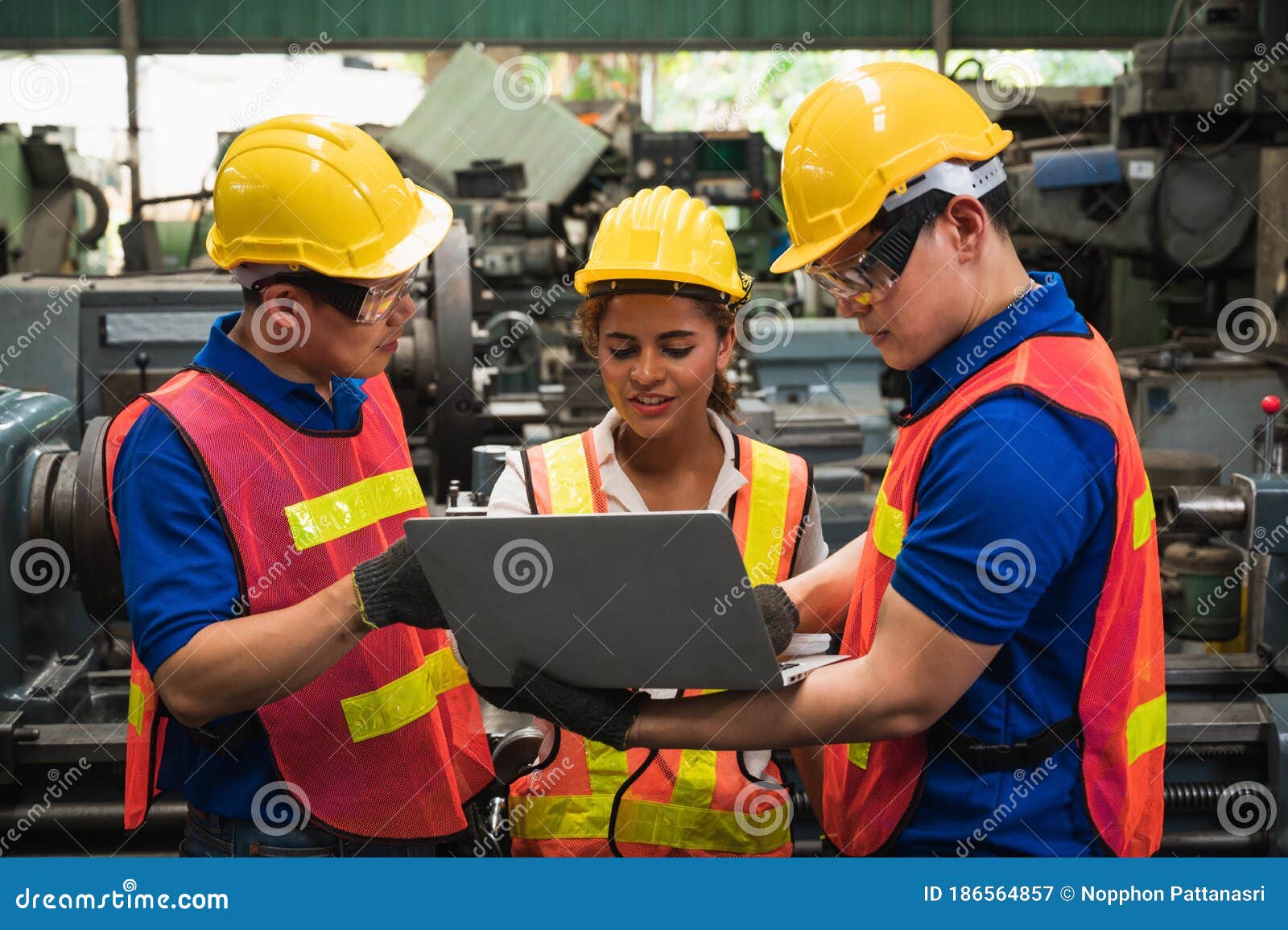 The Industrial Worker Team is Working on Various Projects in a Large