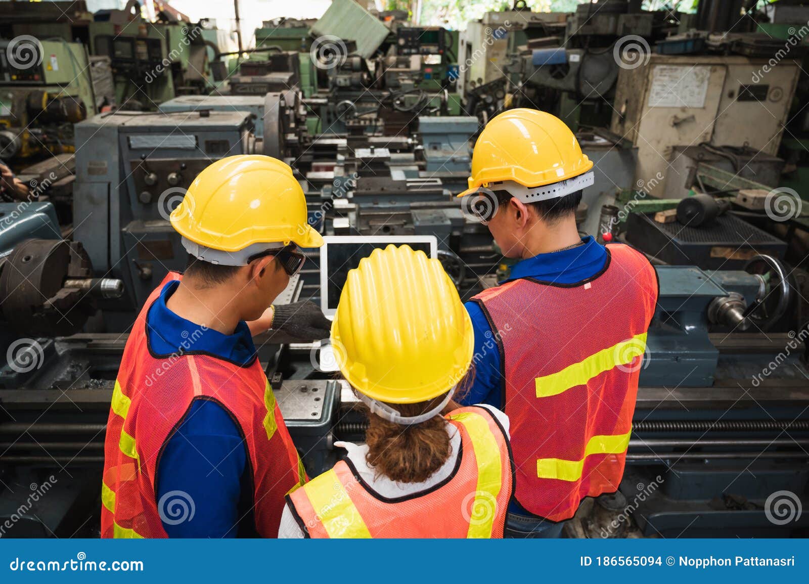 The Industrial Worker Team is Working on Various Projects in a Large