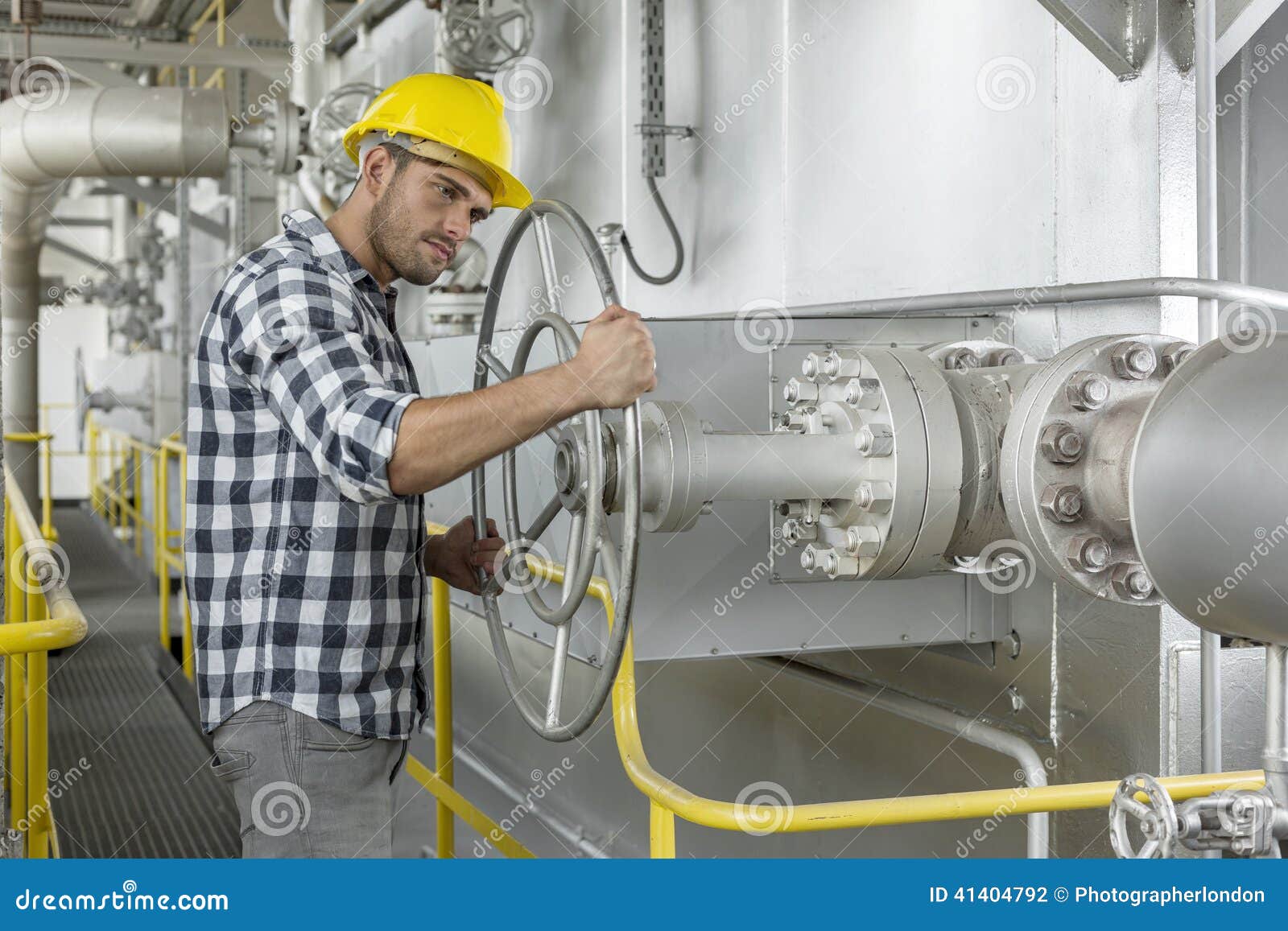 Industrial Worker Turning Large Valve Stock Photo Image of rotating