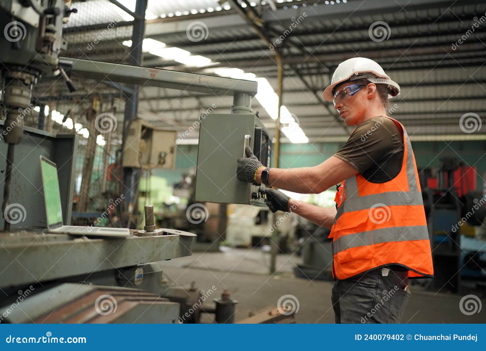 industry engineer worker operate control heavy machine in factory.