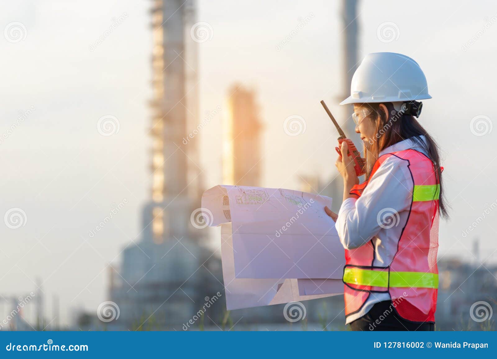 industry safety. the people worker women engineer work control at power plant energy industry manufacturing,