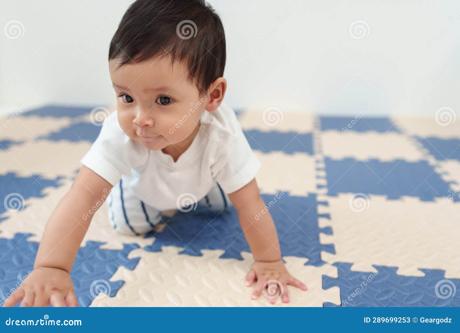 Infant Baby Crawling on Mat or Jigsaw Floor Stock Image Image of