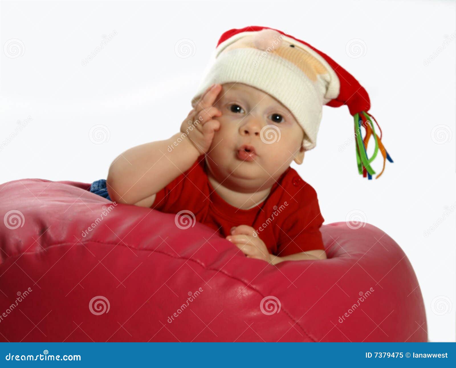 Infant on Bean Bag Wearing a Hat Stock Image Image of christmas