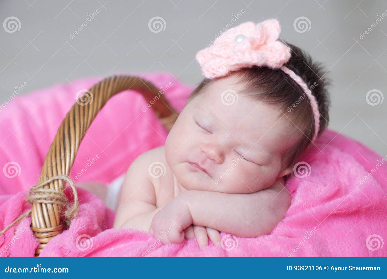 Infant Sleeping in Basket with Knitted Flower on Head, Baby Girl ...