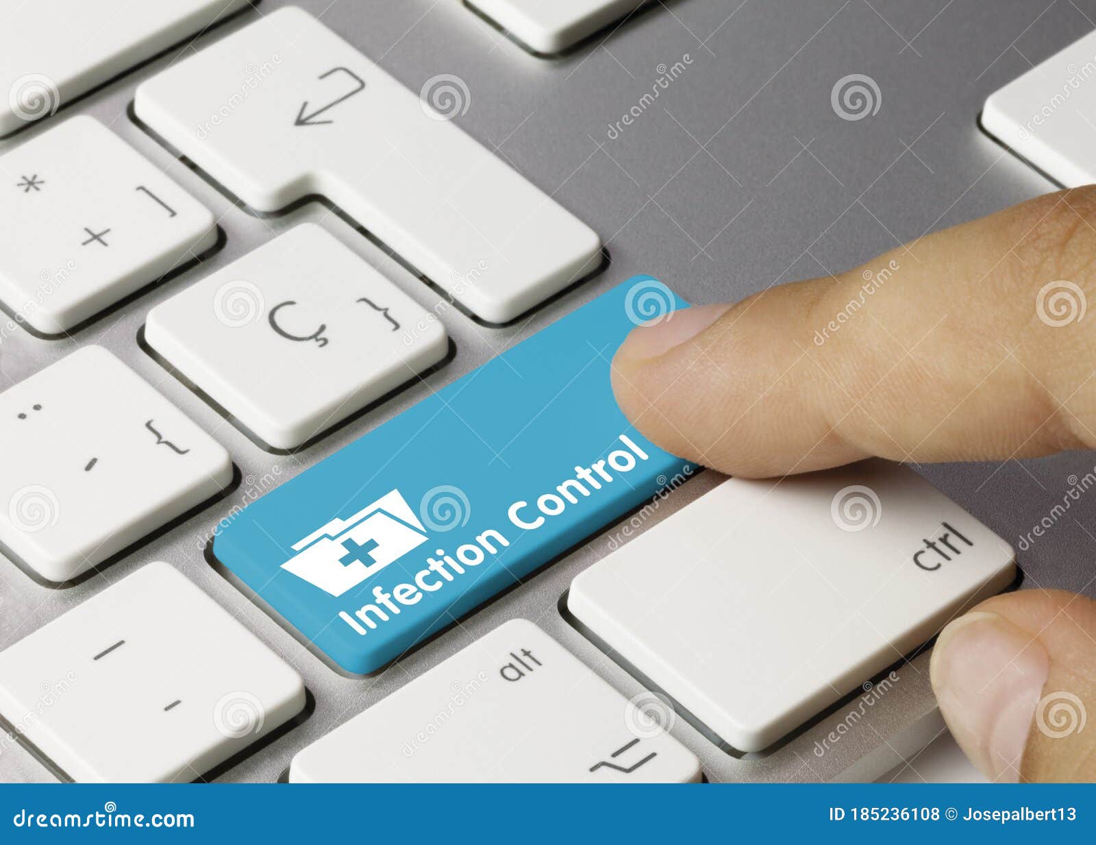 infection control - inscription on blue keyboard key