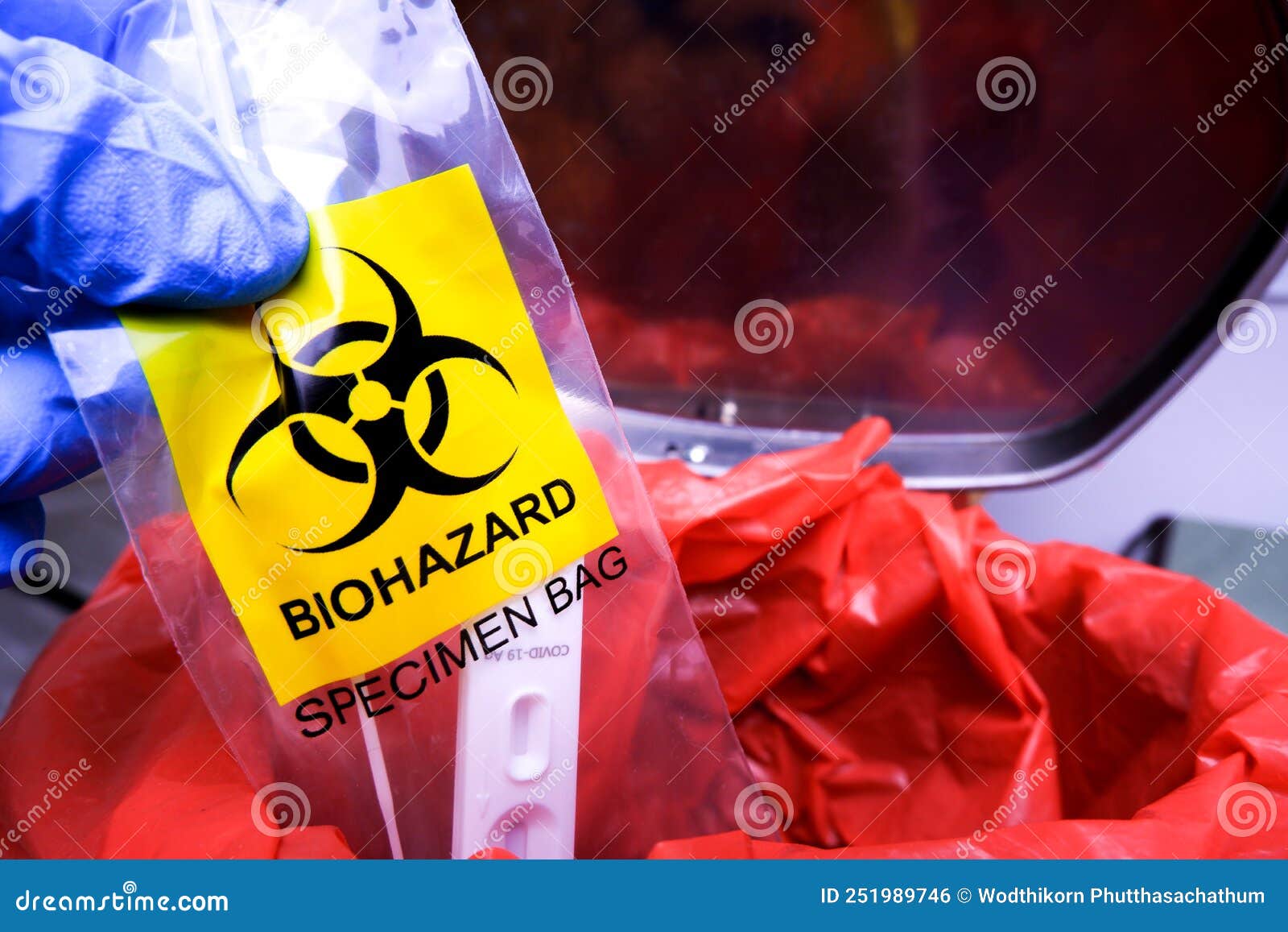 Infectious Garbage is Being Thrown into the Red Infectious Waste Bin