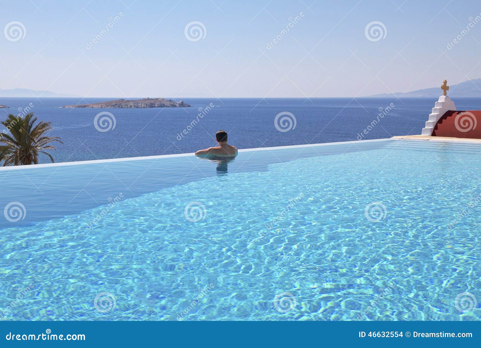 Infinity Pool And Man Mykonos Stock Photo Image Of Pool Vacations 46632554