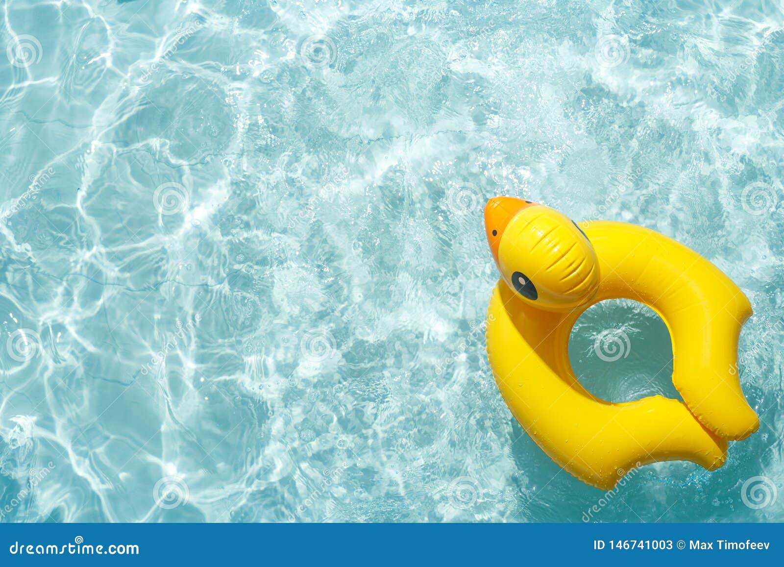 Inflatable Float Rubber Ring in the Shape of a Yellow Duckling in Blue ...