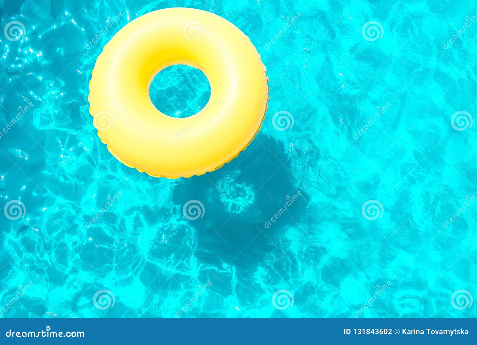 Inflatable Ring Swimming in the Pool on a Sunny Day Stock Photo - Image ...