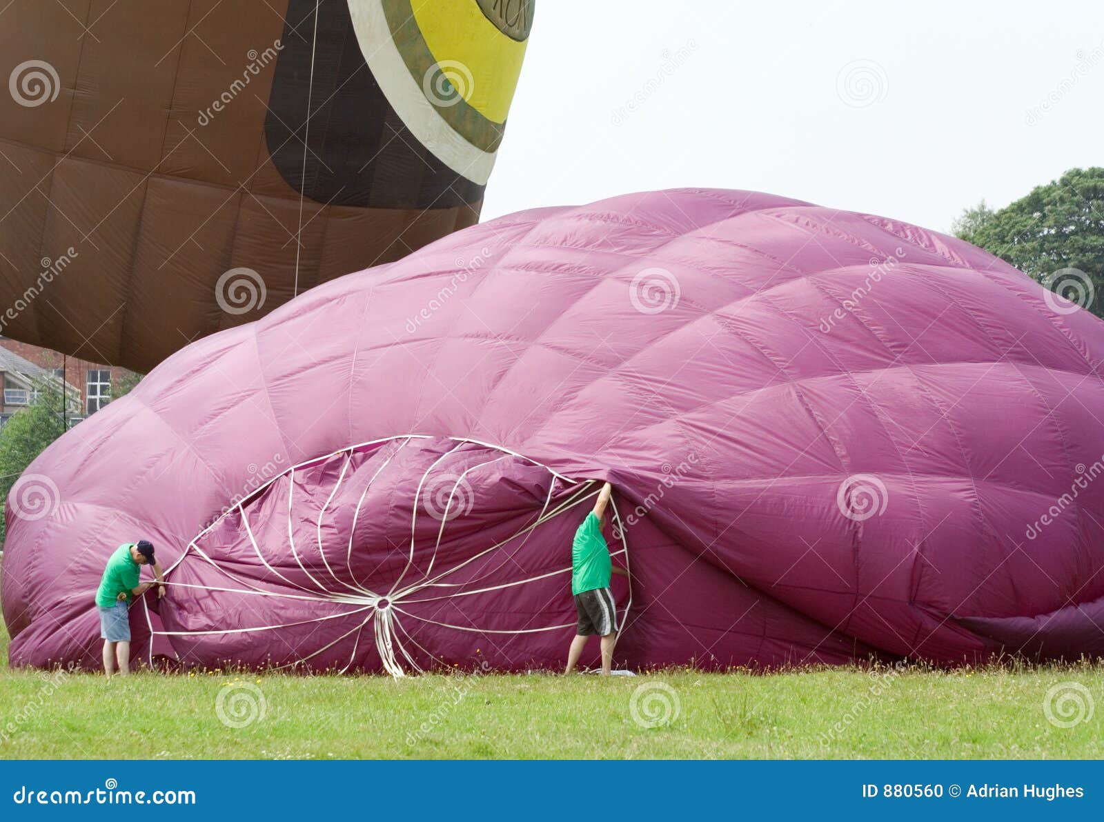 Inflating a Hot Air Balloon Stock Photo Image of team, silk 880560