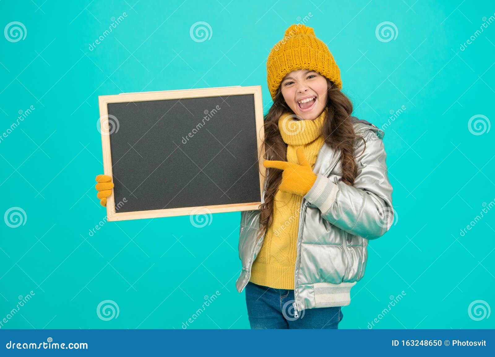 informing kids community. kid with blackboard. promoting product. child promoting event. promotion concept. kid cheerful