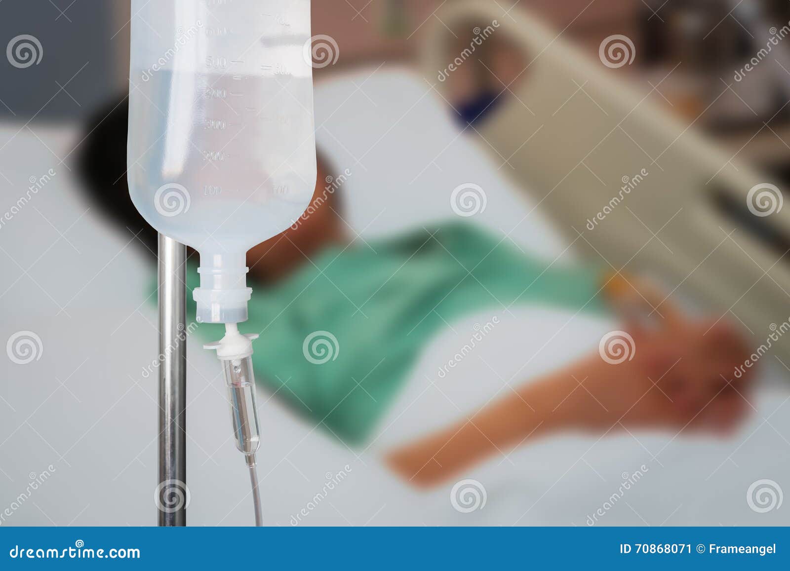 Infusion Bottle with Saline Solution for Patient in Hospital Room Stock