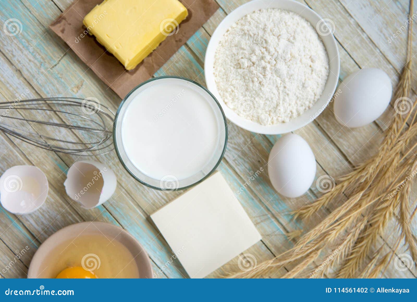 Ingredients for Baking Milk, Flour, Egg and Butter Top View Stock
