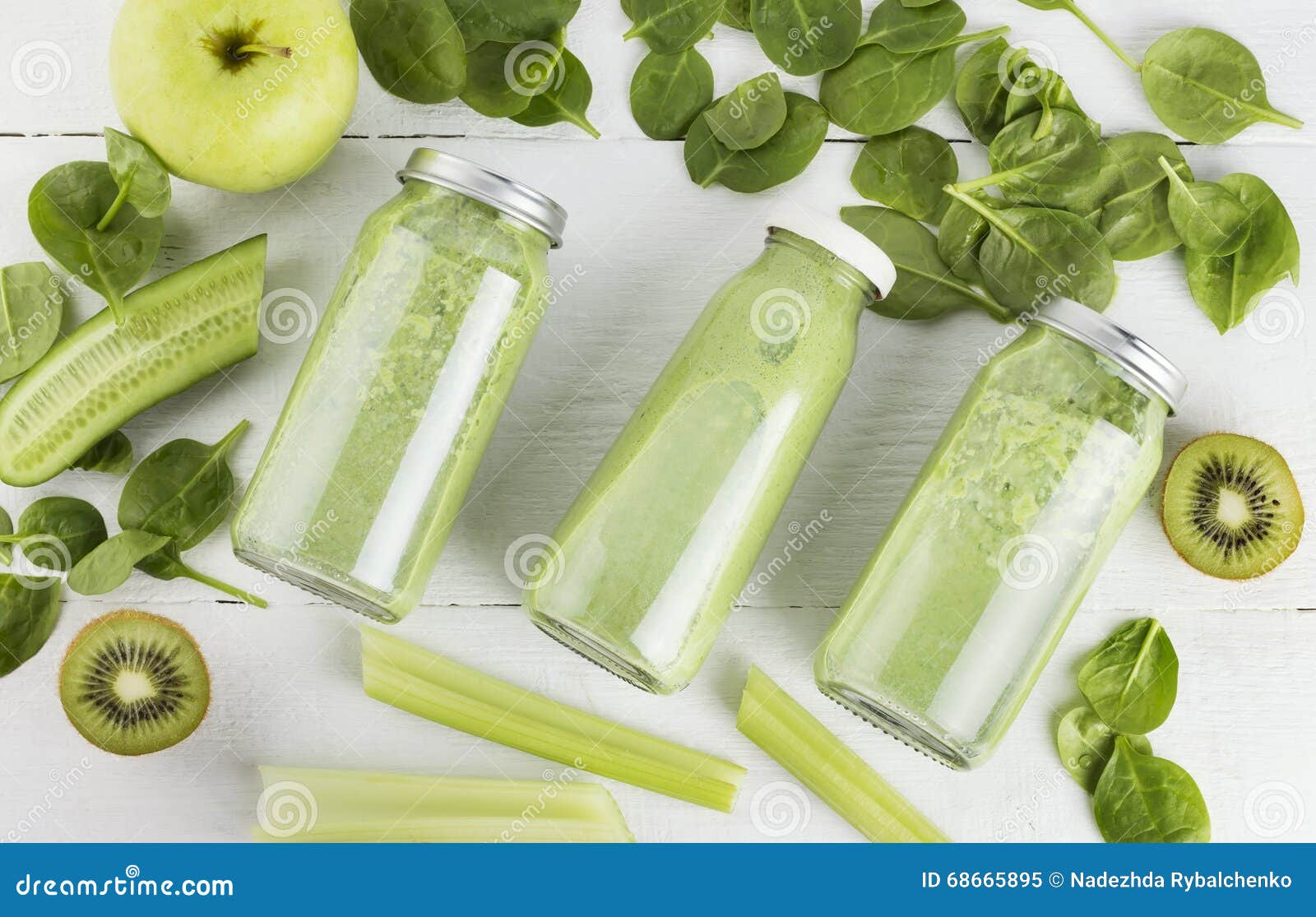 Ingredients for Smoothie Spinach, Kiwi, Apple, Celery on a Whit Stock