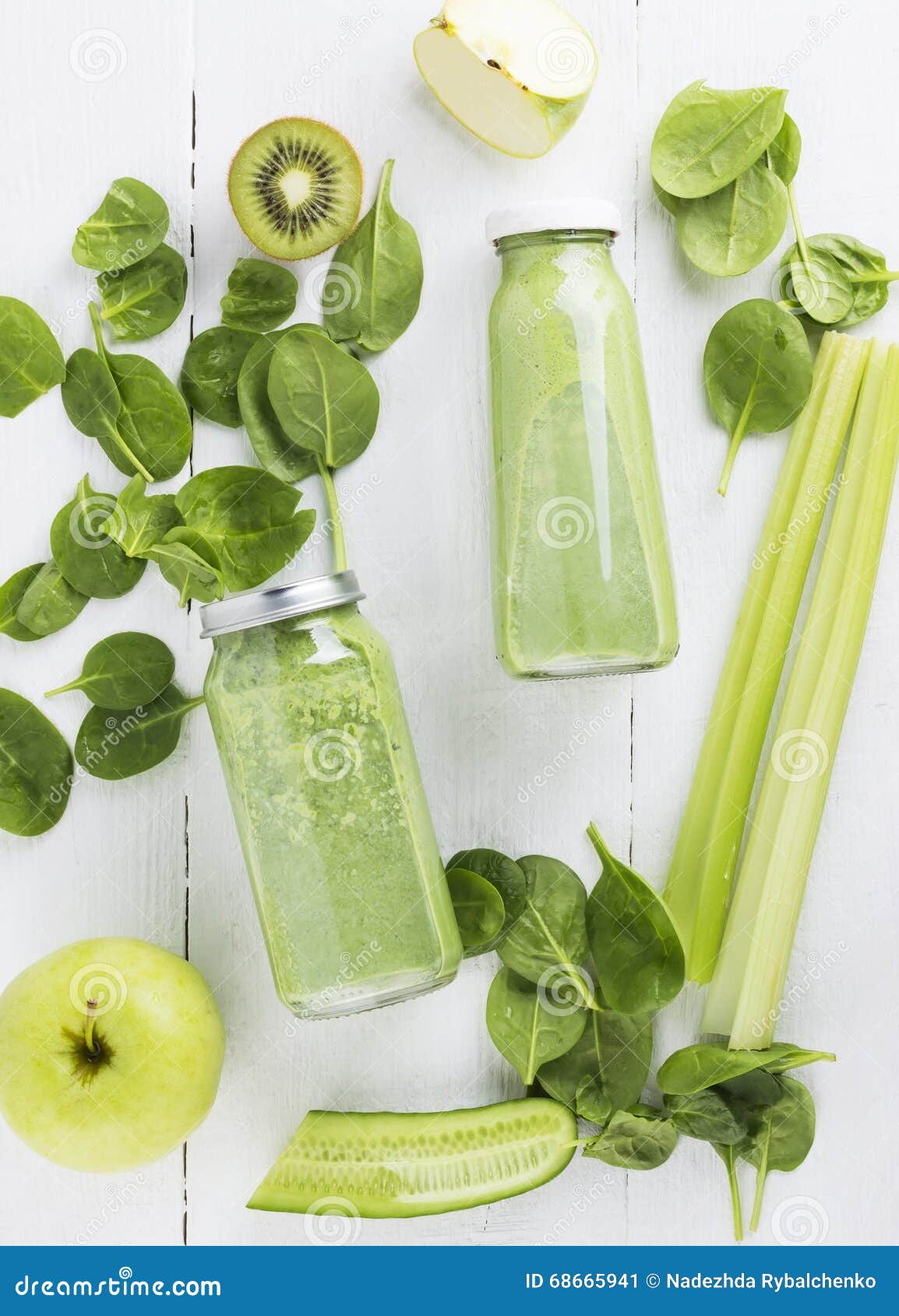 Ingredients for Smoothie Spinach, Kiwi, Apple, Celery on a Whit Stock