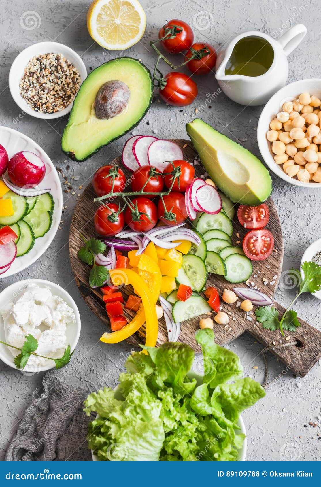 ingredients for spring vegetable buddha bowl. delicious healthy food. on a gray background