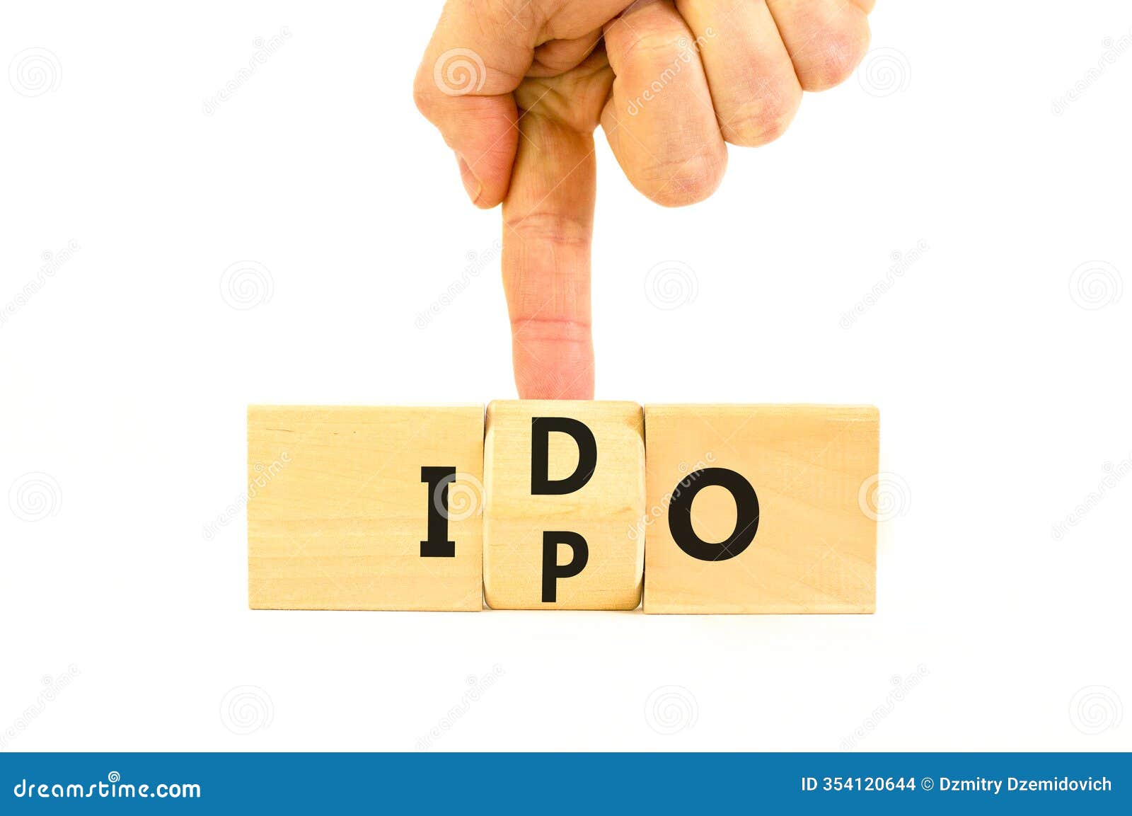 initial public or dex offering . concept words abbreviation ipo or ido on wooden block. beautiful white table white