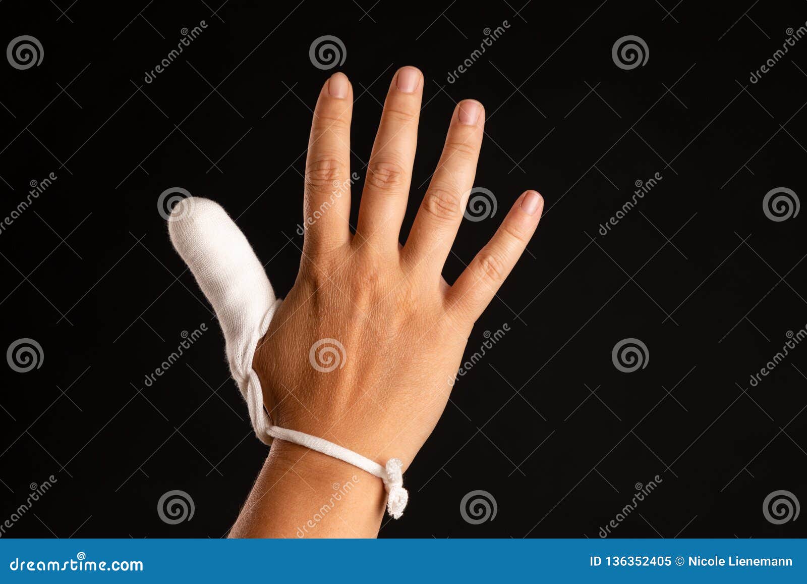 Injured thumb with bandage stock image. Image of symbol 136352405
