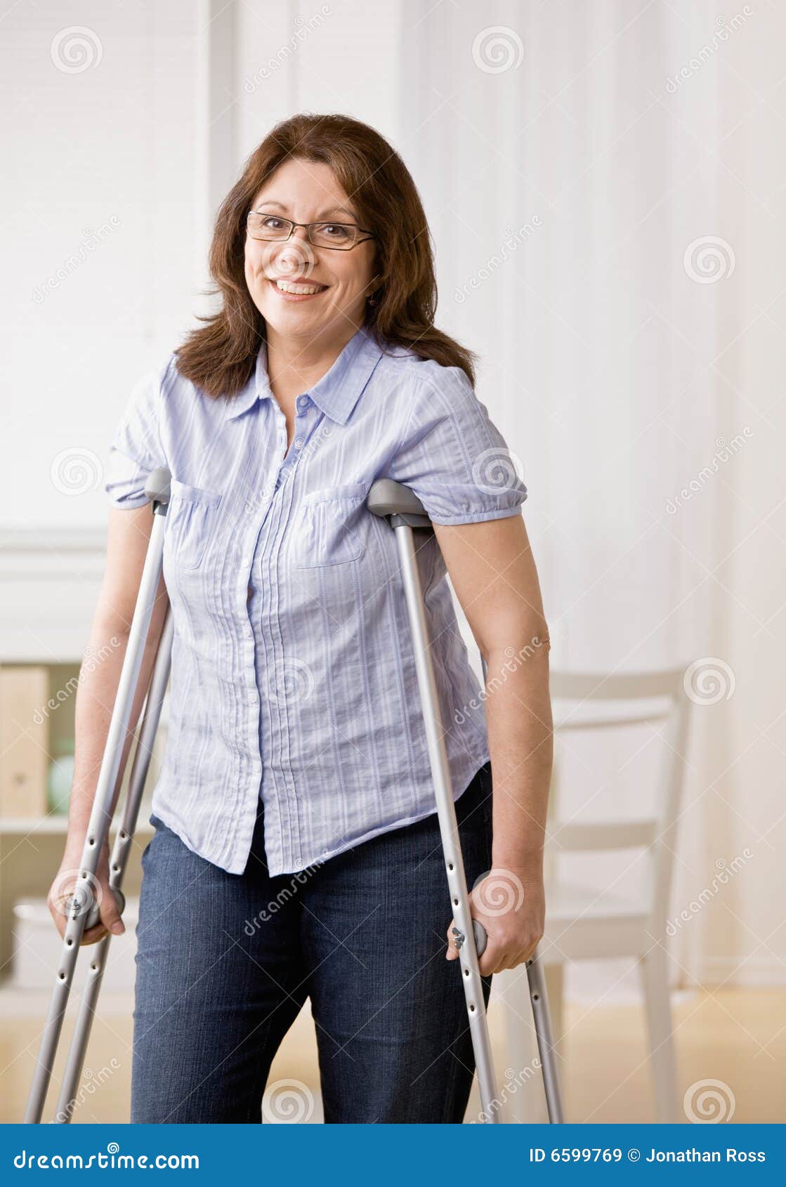 Injured Woman Using Crutches To Walk Stock Image Image of help, female 6599769