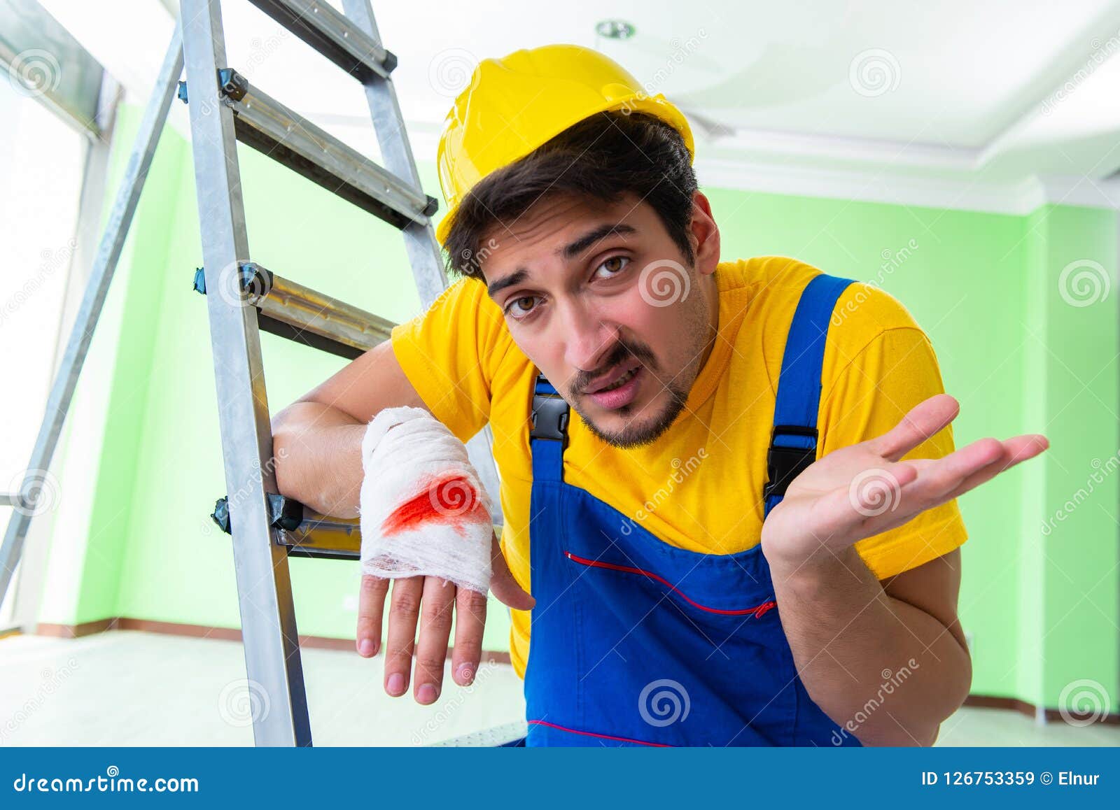 The Injured Worker at the Work Site Stock Image Image of bandage