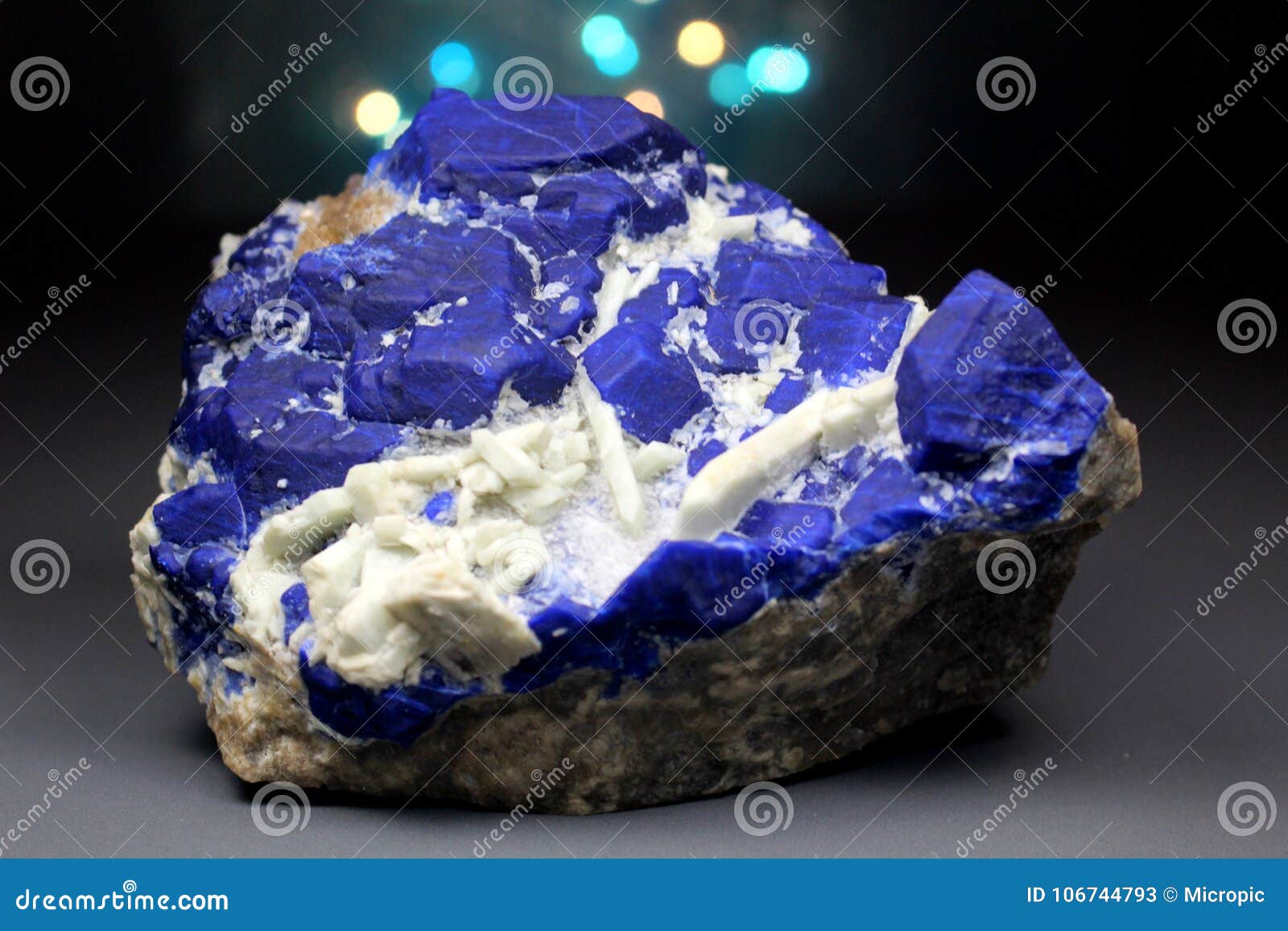 ink blue lazurite with white forsterite specimen