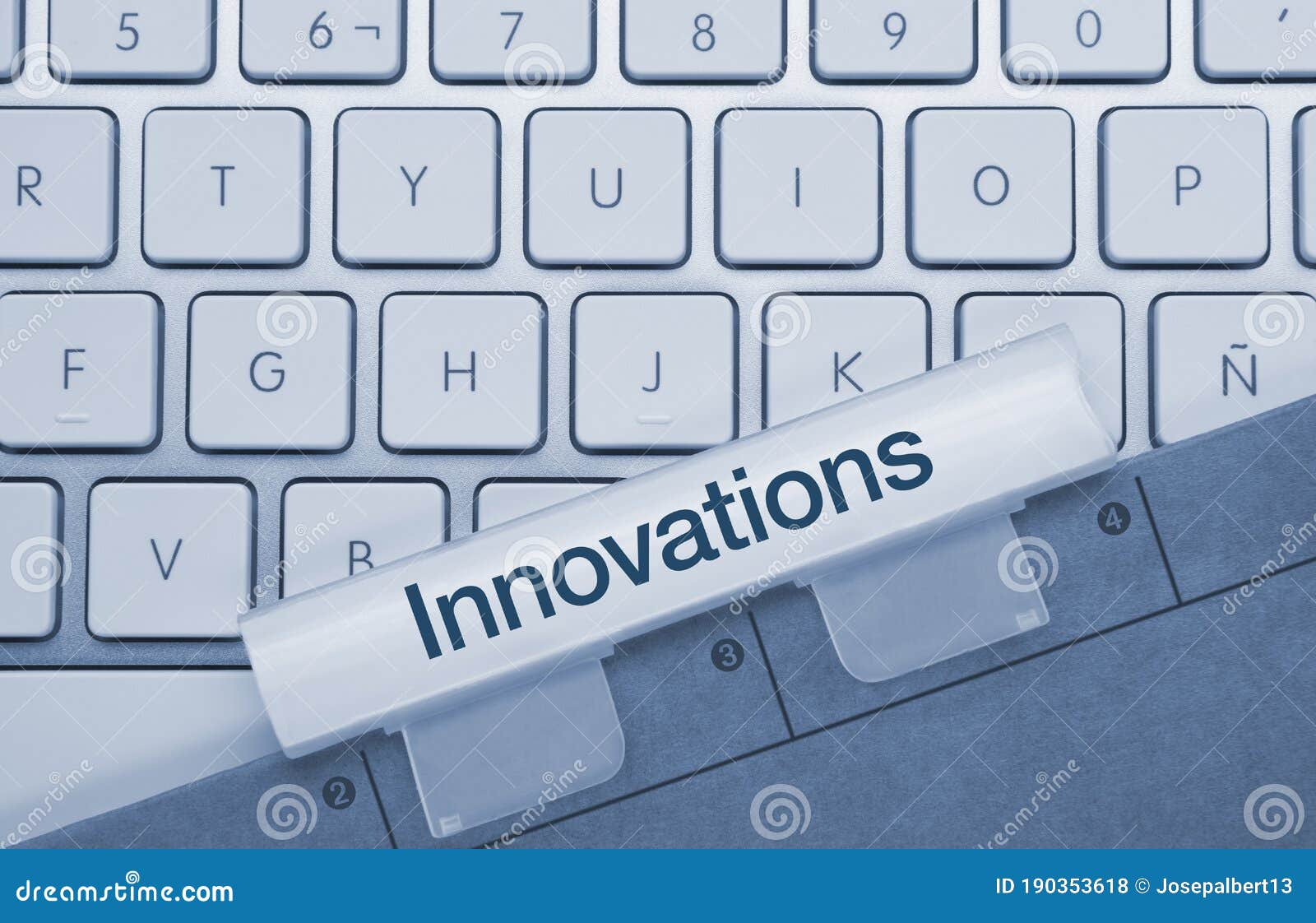 innovations - inscription on blue keyboard key