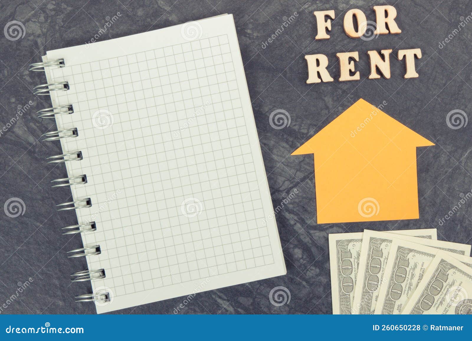 Inscription for Rent, Dollar and Notepad for Notes. Renting House or