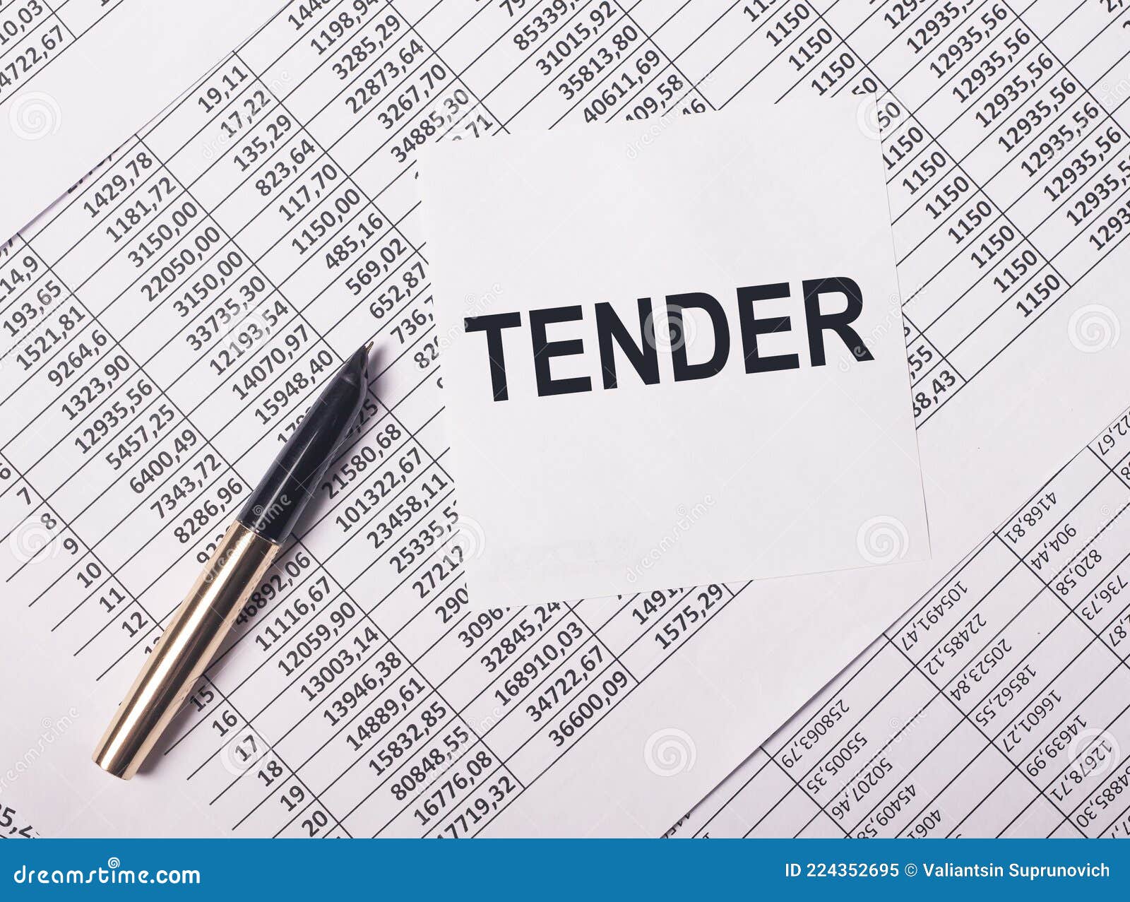 inscription tender on paper note over business financial papers