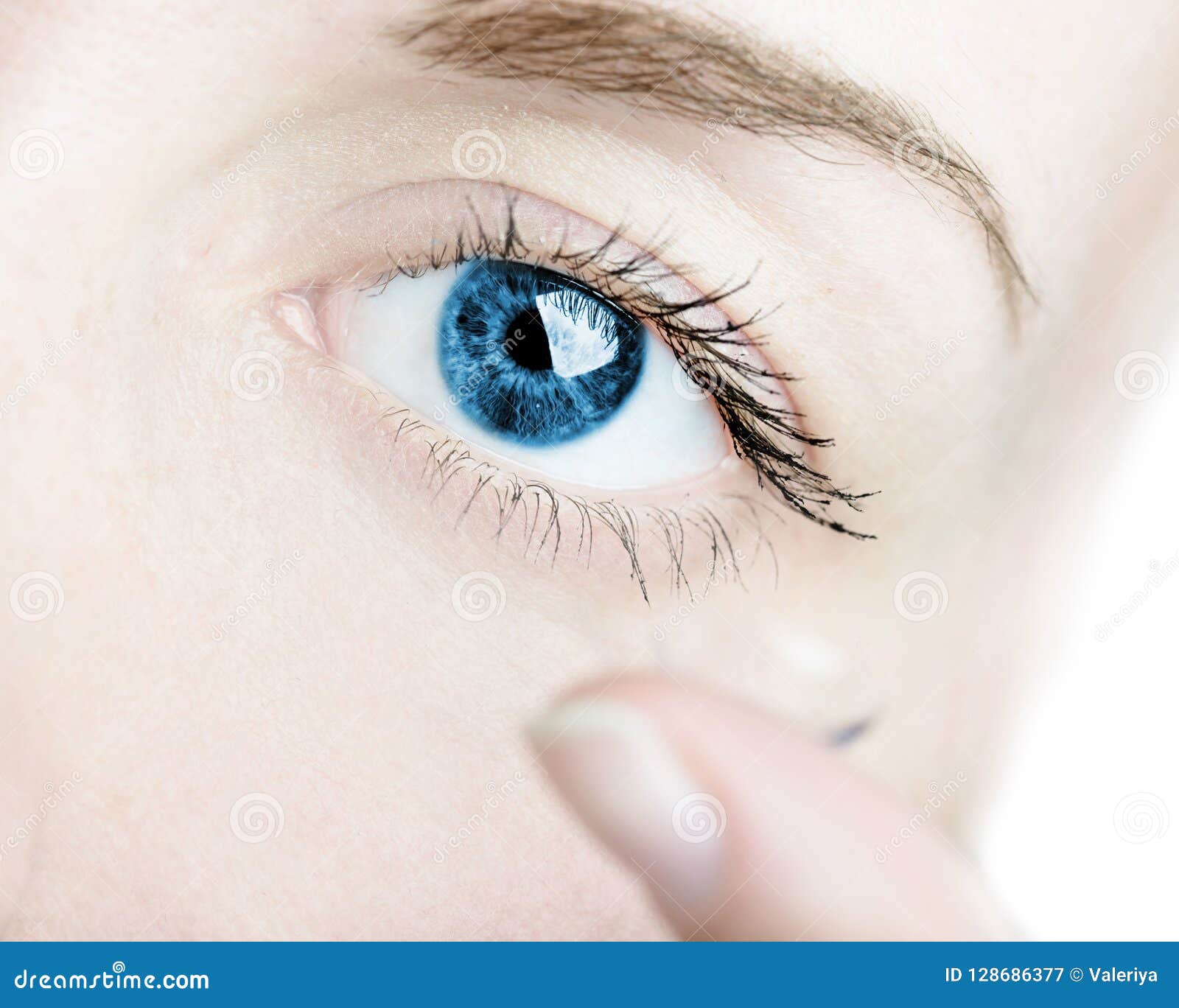 Inserting a Contact Lens in Female Eye Stock Image Image of eyesight, blue 128686377