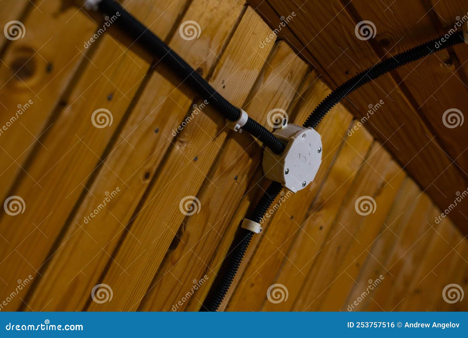 Inserting Electrical Cables into a Wooden House through the Air with