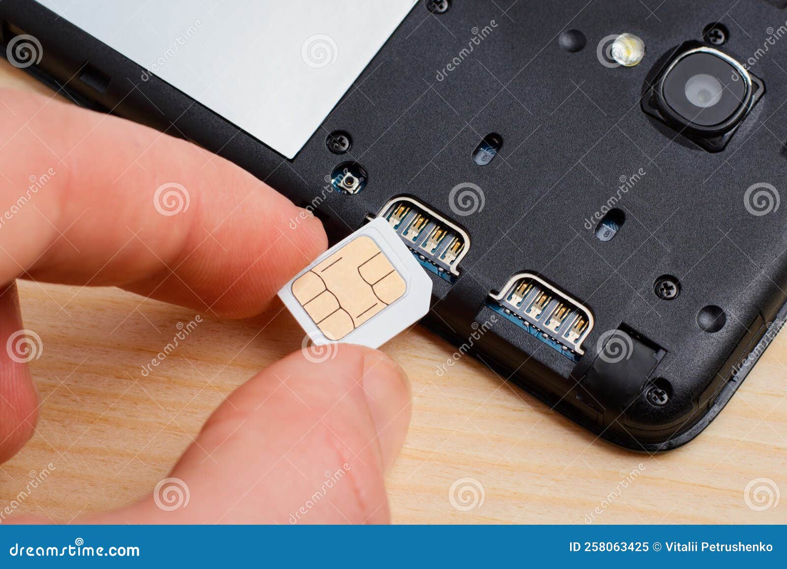 Inserting SIM card stock image. Image of hardware, communication