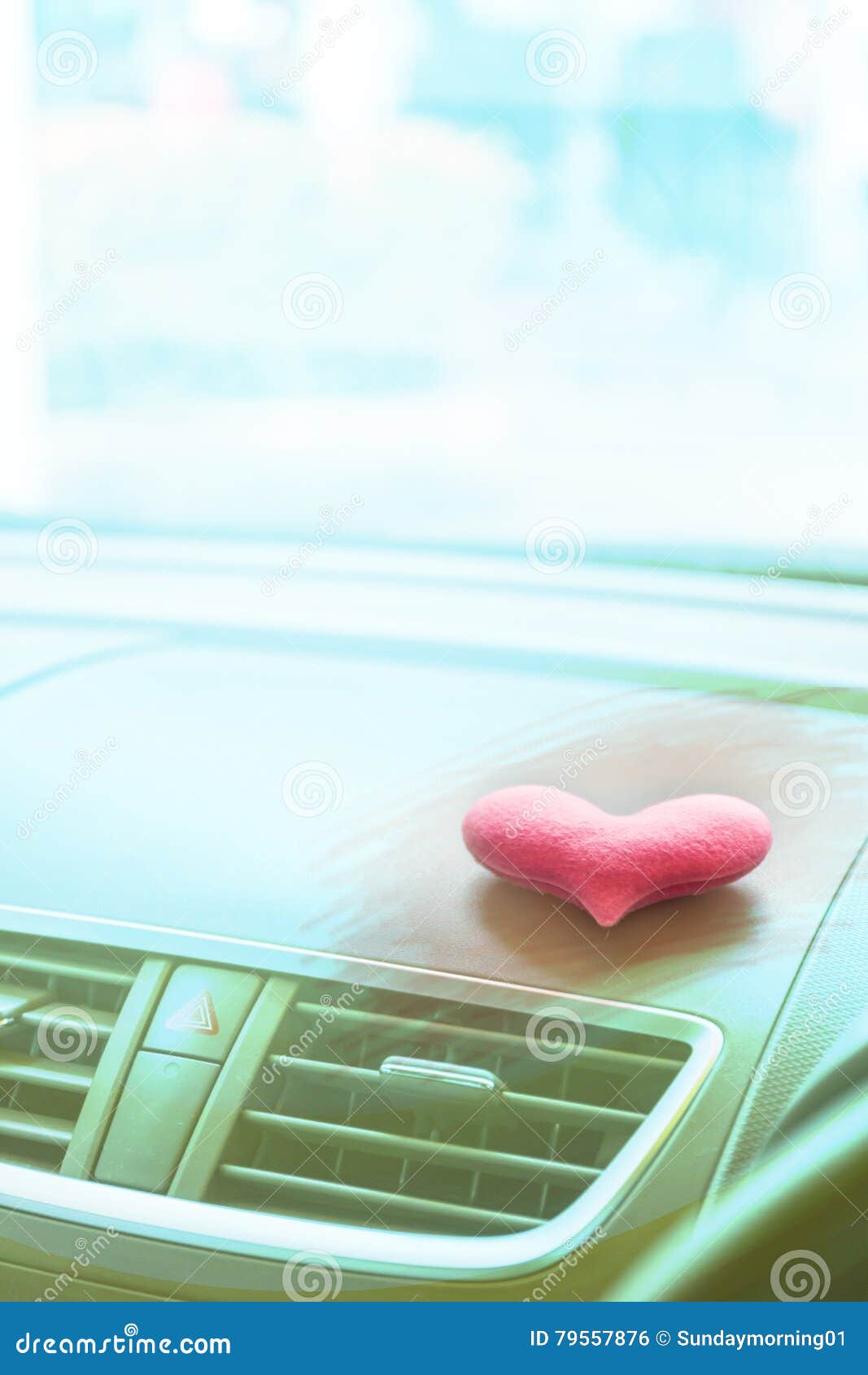 Inside Car with Pink Heart with Pink Light Filter Stock Photo Image