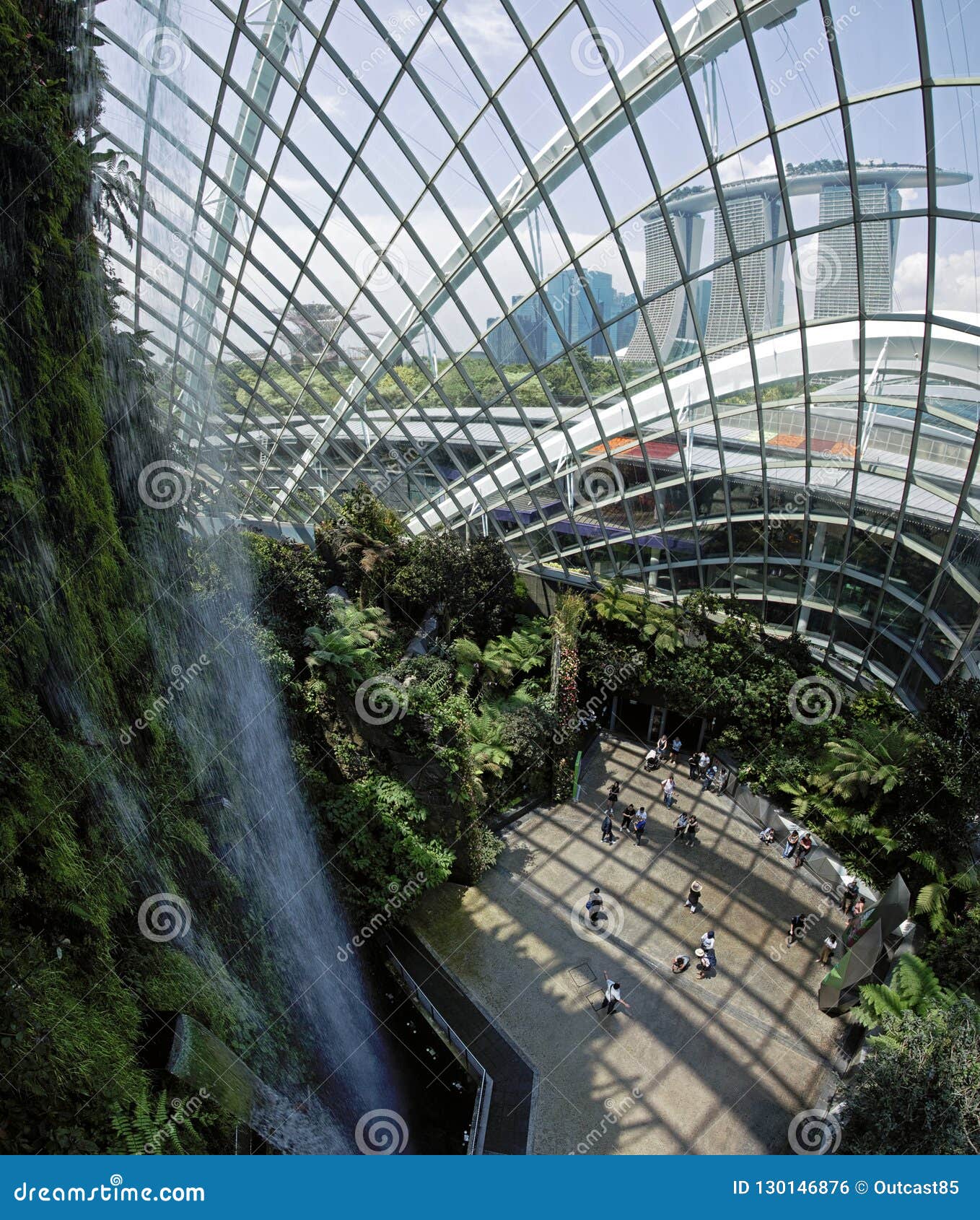 It mimicks tropical mountainous regions 3,500m above sea level. Singapore Gardens By The Bay Cloud Forest - Inside The Cloud Forest Dome Gardens By The Bay In Singapore On Background The Marina Bay Sands Hotel Editorial Photo Image Of Dome October 130146876