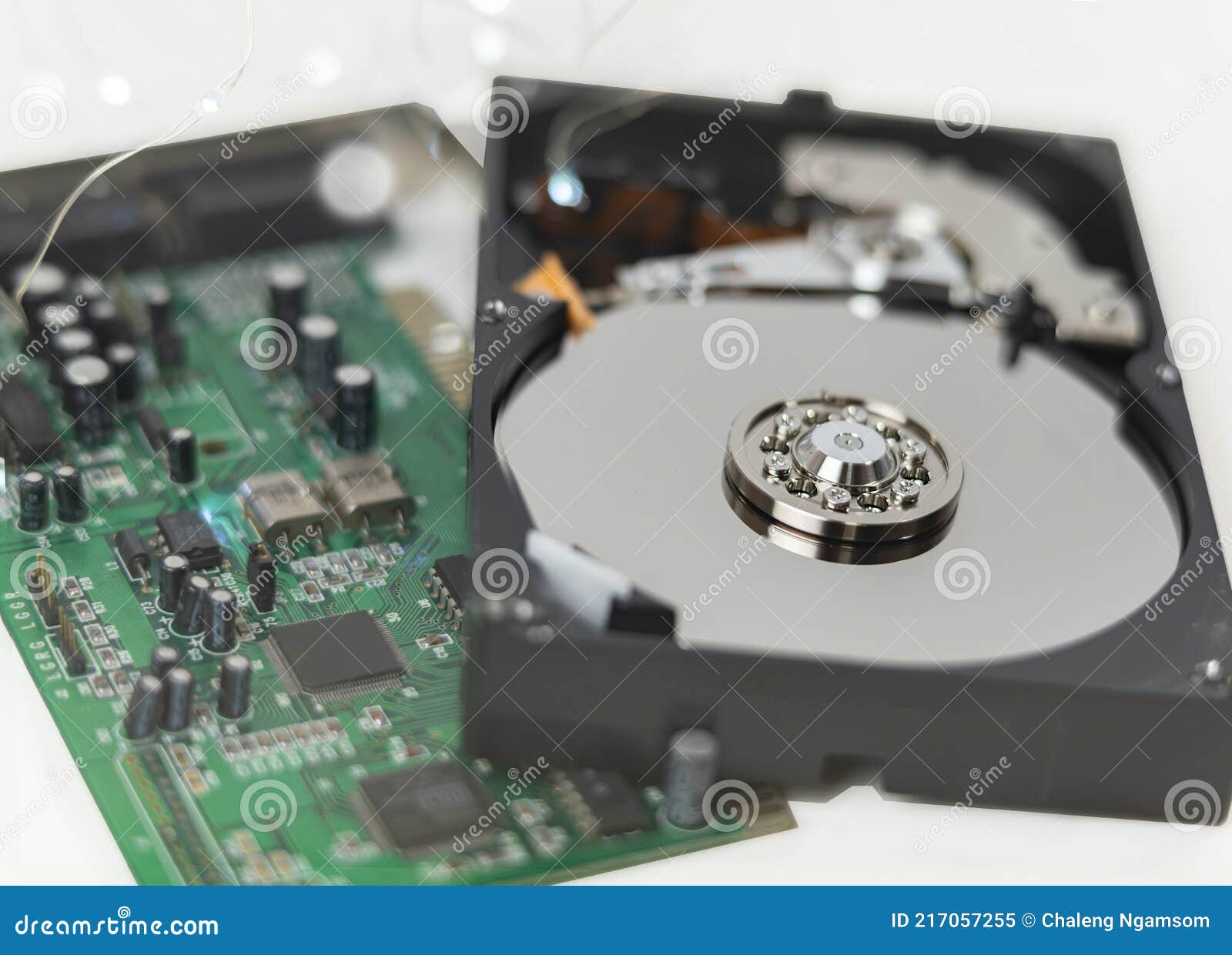 inside dise in hard drive on the technician`s desk