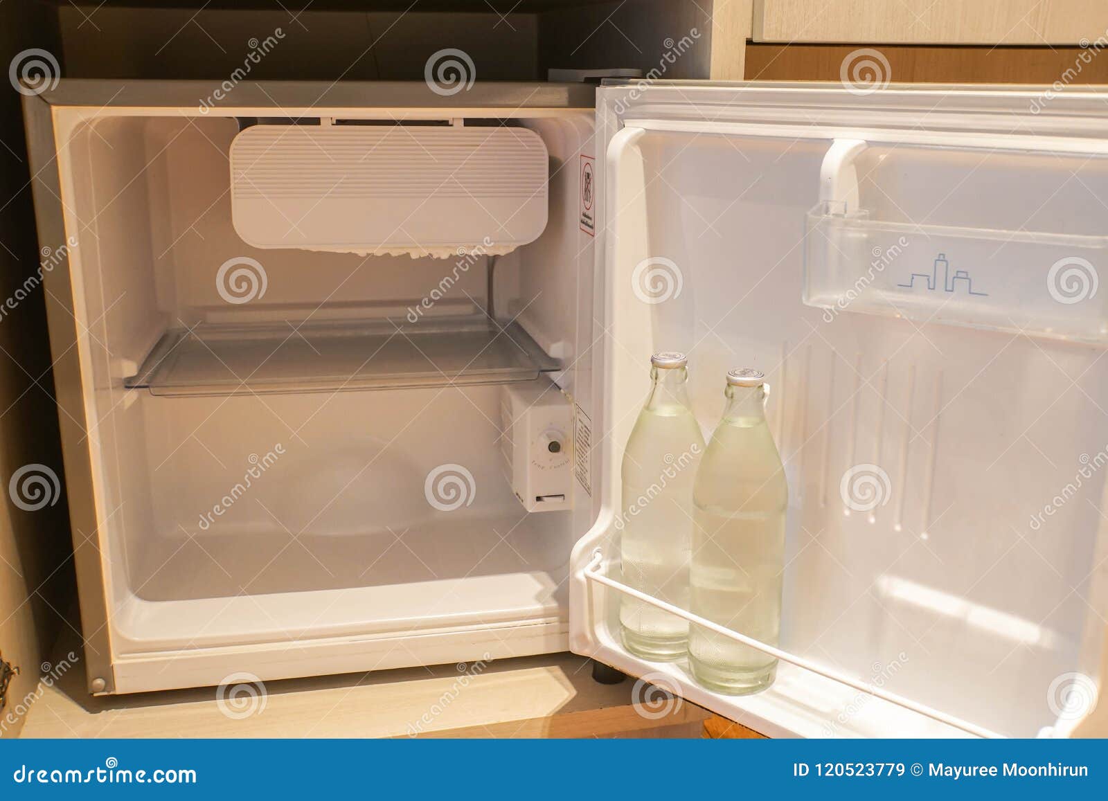 Inside the Mini Fridge in Hotel Bedroom with Water Bottle Stock Image -  Image of furniture, equipment: 120523779