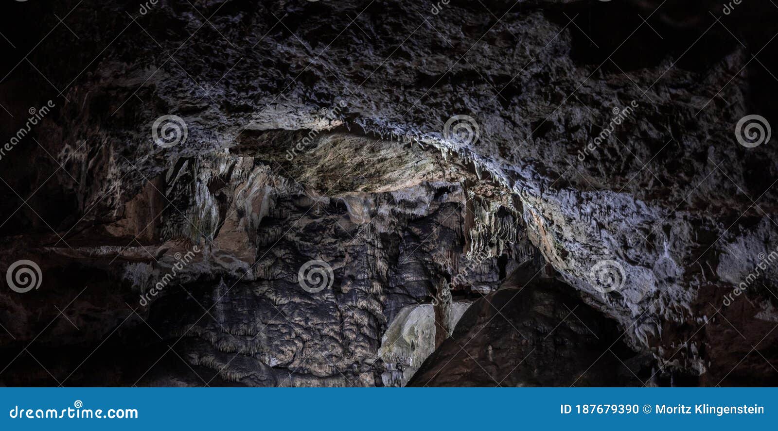 inside the mysterious flowstone cave `nebelhÃÂ¶hle` with stalagmites and stalactites in germany