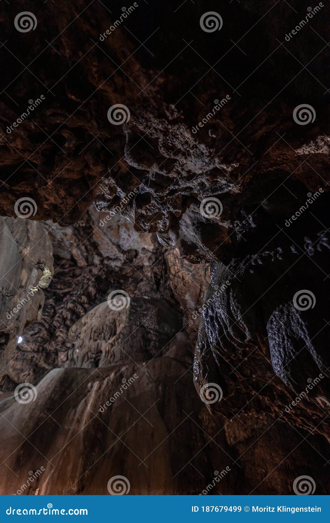 inside the mysterious flowstone cave `nebelhÃÂ¶hle` with stalagmites and stalactites in germany