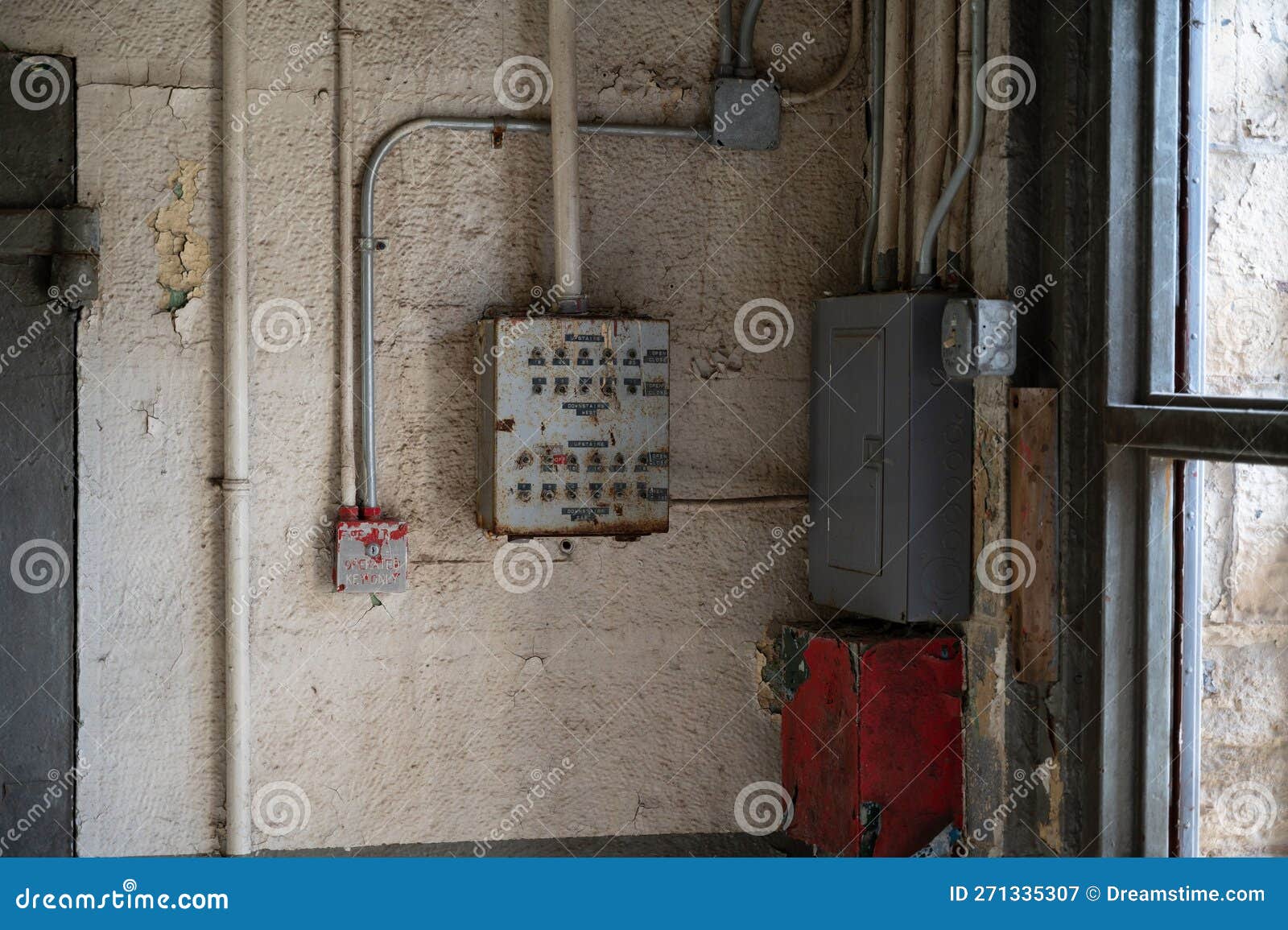Inside of an Old Joliet Prison with a Red Box and a Variety of