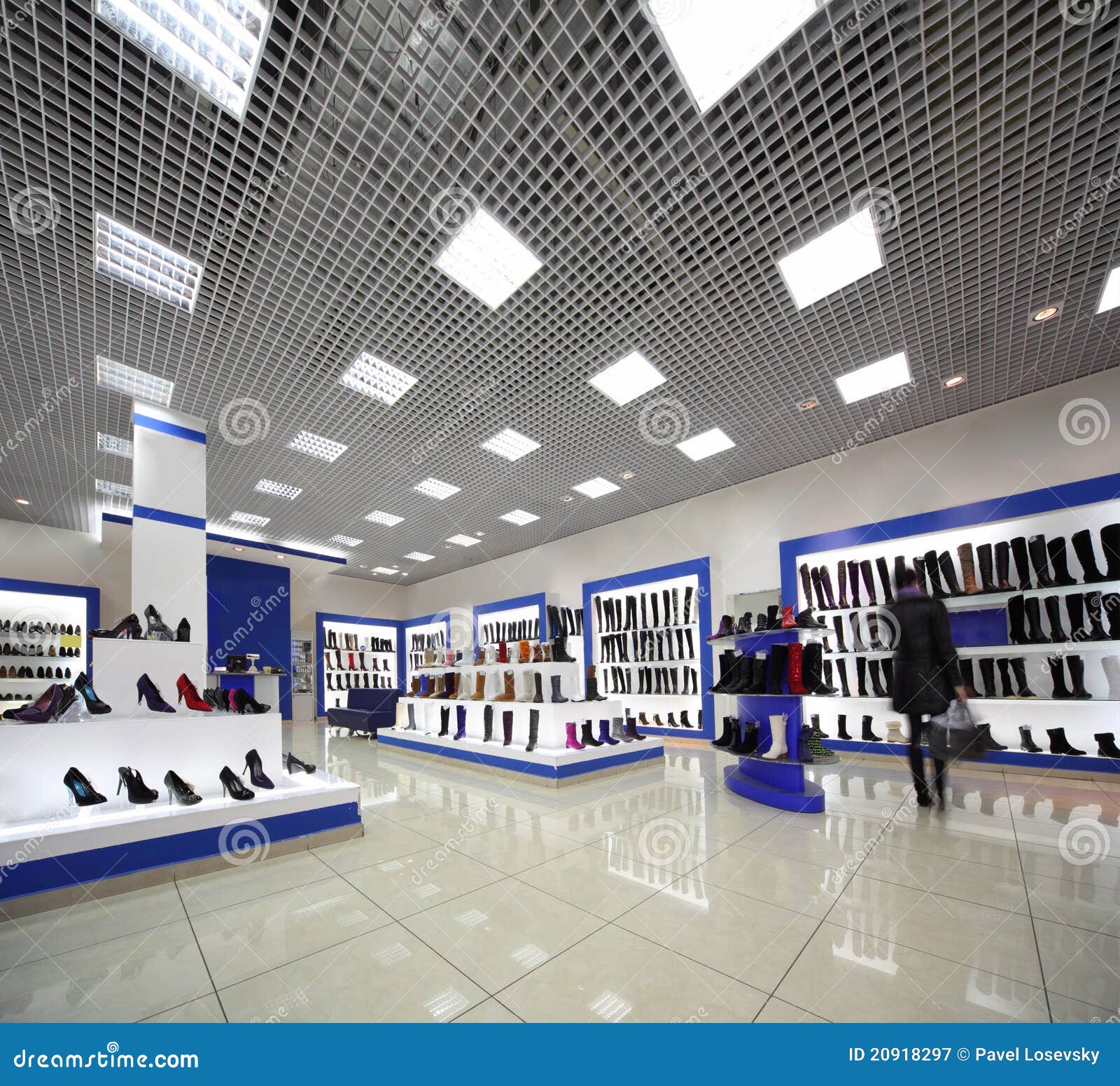 Inside Spacious Shoes Shop with Models on Shelves Stock Image - Image ...