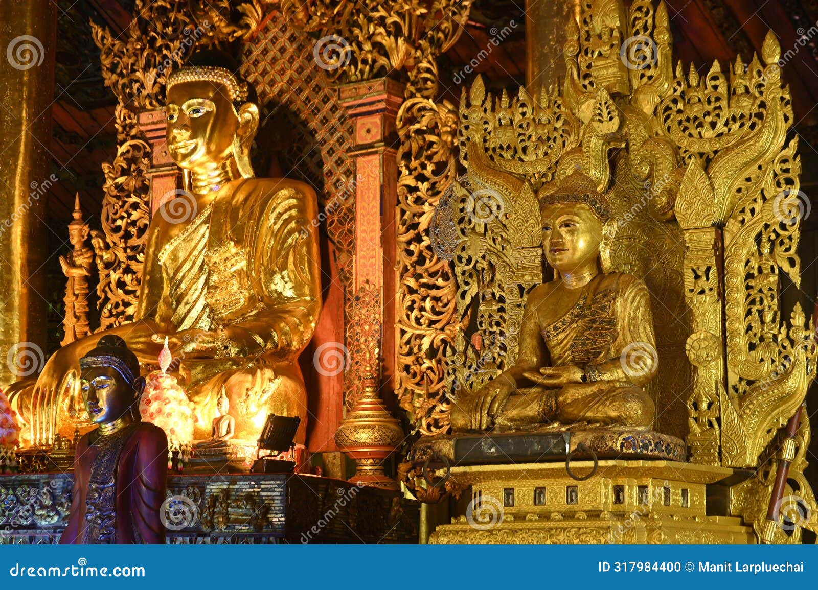 inside the wat nantaram temple is a golden teak buddha image. name of buddha metta it is a buddha image.