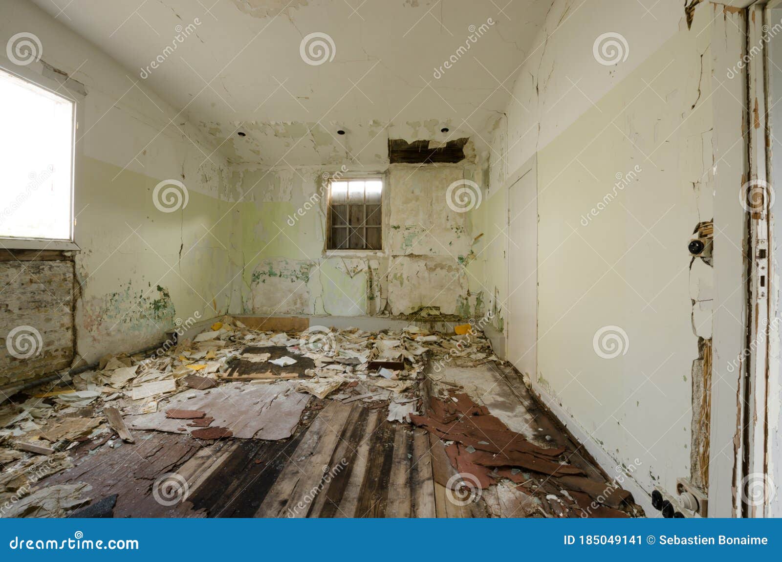 Inside View of an Abandoned House with Debris and Damaged ...