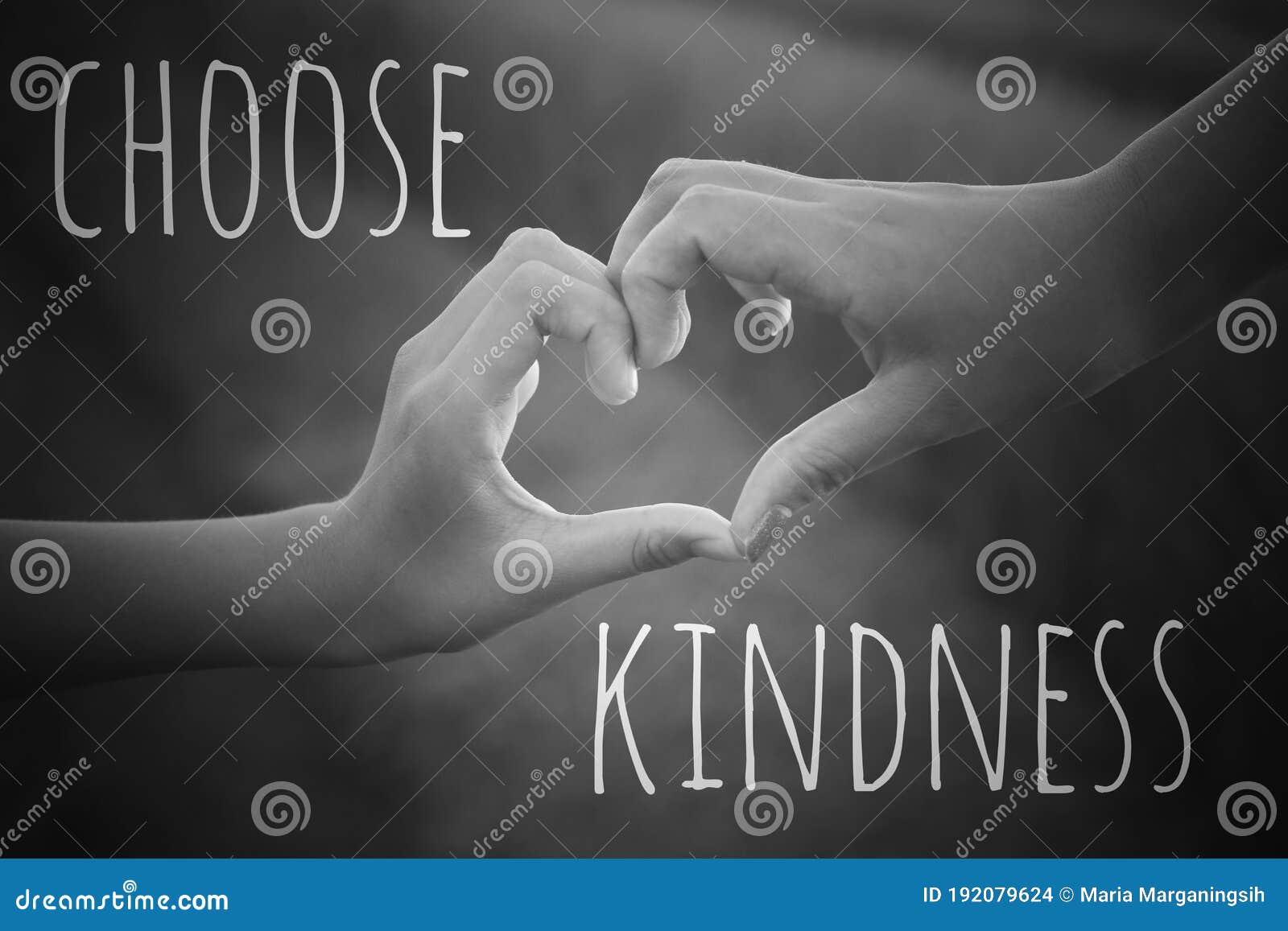 inspirational quote - choose kindness. with hands making love sign on black and white background. being kind concept.