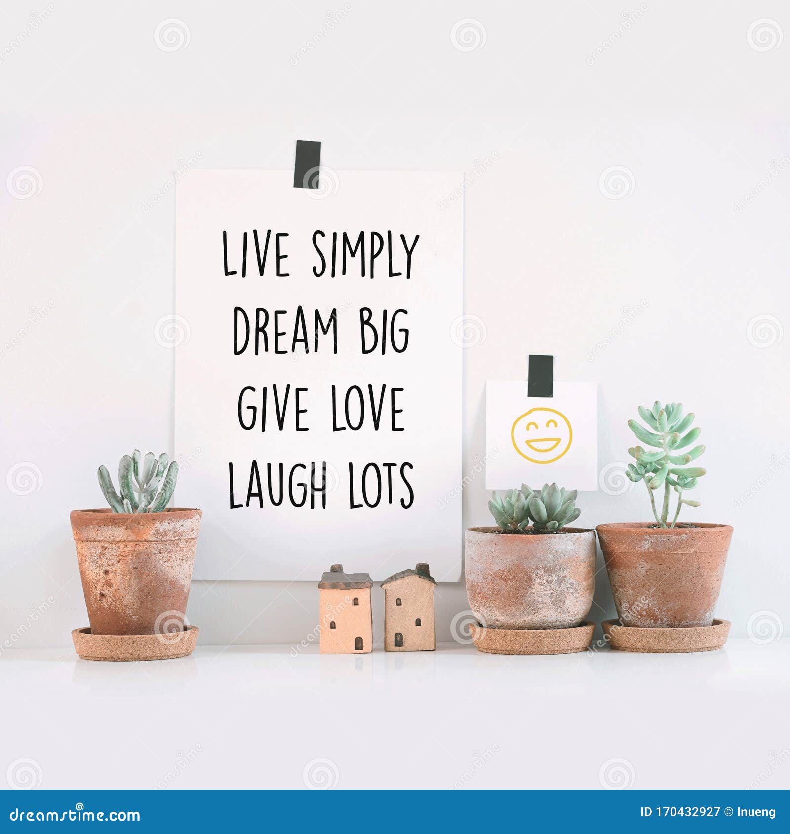 inspirational quote `live simply, dream big, give love, laugh lots`.