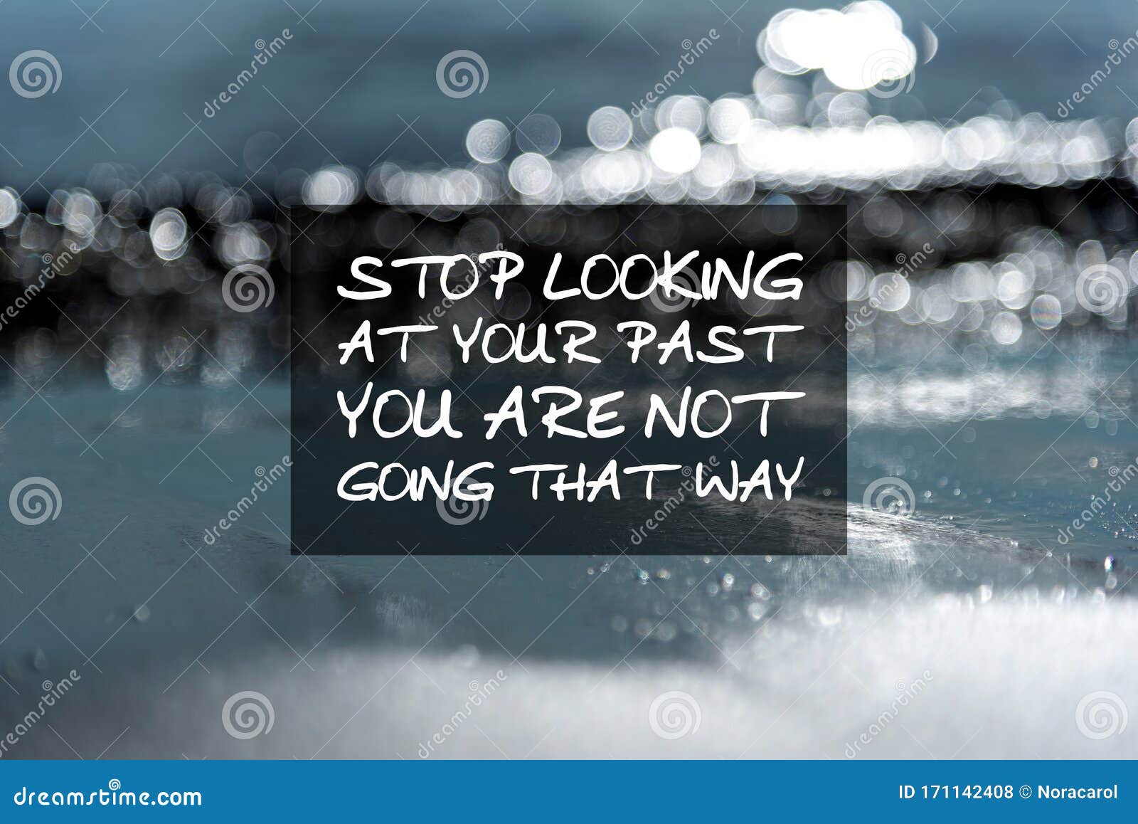 inspirational quotes - stop looking at your past you are not going that way. blurry background